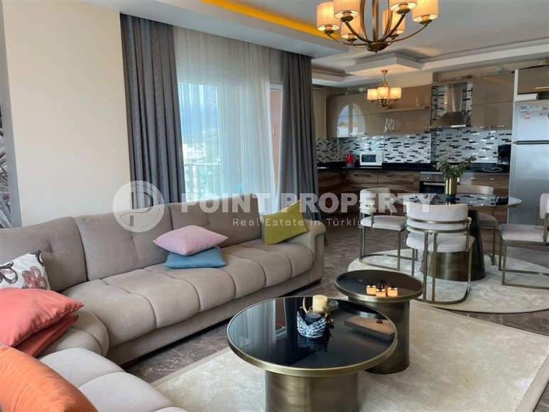 Panoramic apartment with sea views, on the 10th floor in a residential complex built in 2015, in the center of Mahmutlar district-id-6408-photo-3