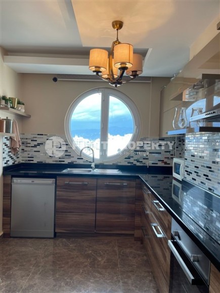 Panoramic apartment with sea views, on the 10th floor in a residential complex built in 2015, in the center of Mahmutlar district-id-6408-photo-6