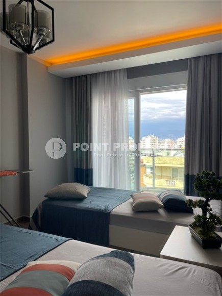 Panoramic apartment with sea views, on the 10th floor in a residential complex built in 2015, in the center of Mahmutlar district-id-6408-photo-9
