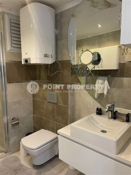 Panoramic apartment with sea views, on the 10th floor in a residential complex built in 2015, in the center of Mahmutlar district-id-6408-photo-10