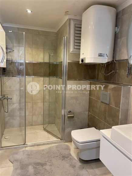 Panoramic apartment with sea views, on the 10th floor in a residential complex built in 2015, in the center of Mahmutlar district-id-6408-photo-11