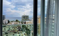 Panoramic apartment with sea views, on the 10th floor in a residential complex built in 2015, in the center of Mahmutlar district-id-6408-photo-15