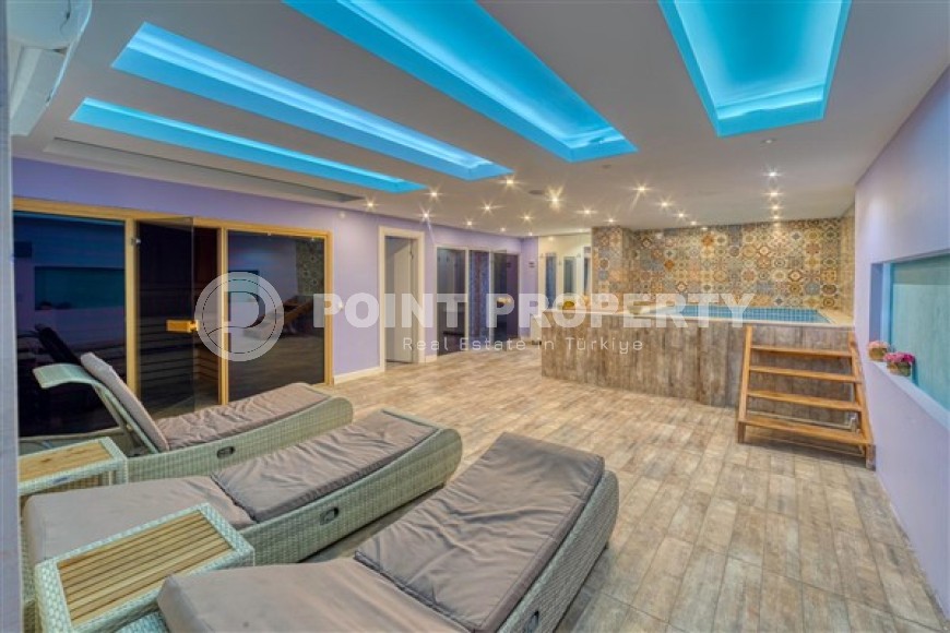 Panoramic apartment with sea views, on the 10th floor in a residential complex built in 2015, in the center of Mahmutlar district-id-6408-photo-18