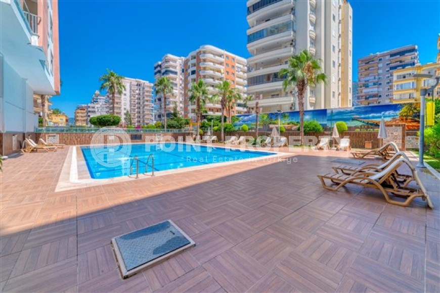 Panoramic apartment with sea views, on the 10th floor in a residential complex built in 2015, in the center of Mahmutlar district-id-6408-photo-19