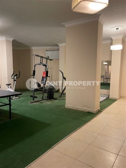 Панорамная квартира с видом на город и Торосские горы, в 50 метрах от моря, в центре района Махмутлар-id-6415-фото-17