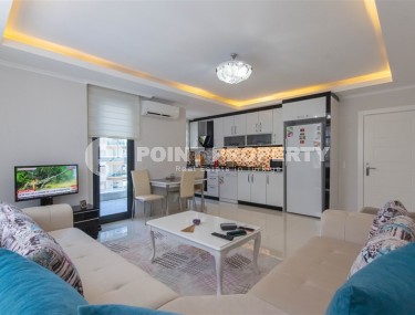 Bright, comfortable apartment 1+1, on an area of 70 m2, on the 4th floor, in the center of a modern, developed area of Alanya - Mahmutlar-id-6416-photo-2