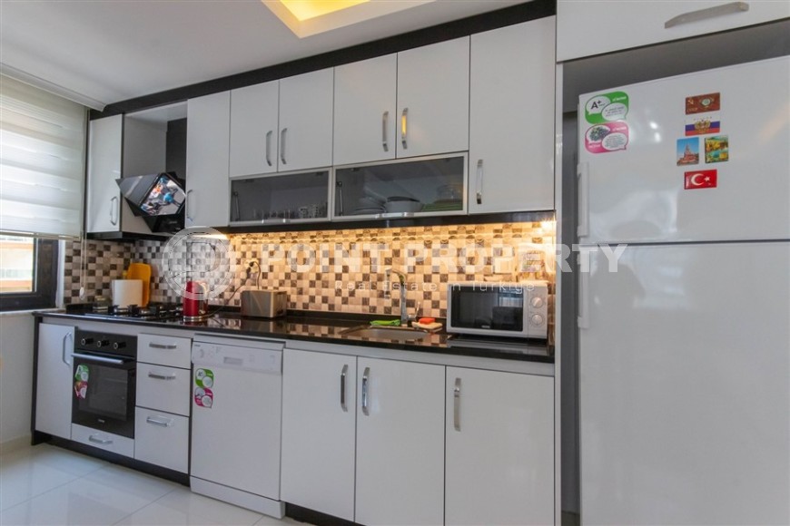 Bright, comfortable apartment 1+1, on an area of 70 m2, on the 4th floor, in the center of a modern, developed area of Alanya - Mahmutlar-id-6416-photo-3