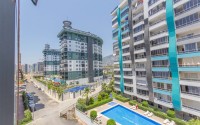 Bright, comfortable apartment 1+1, on an area of 70 m2, on the 4th floor, in the center of a modern, developed area of Alanya - Mahmutlar-id-6416-photo-9