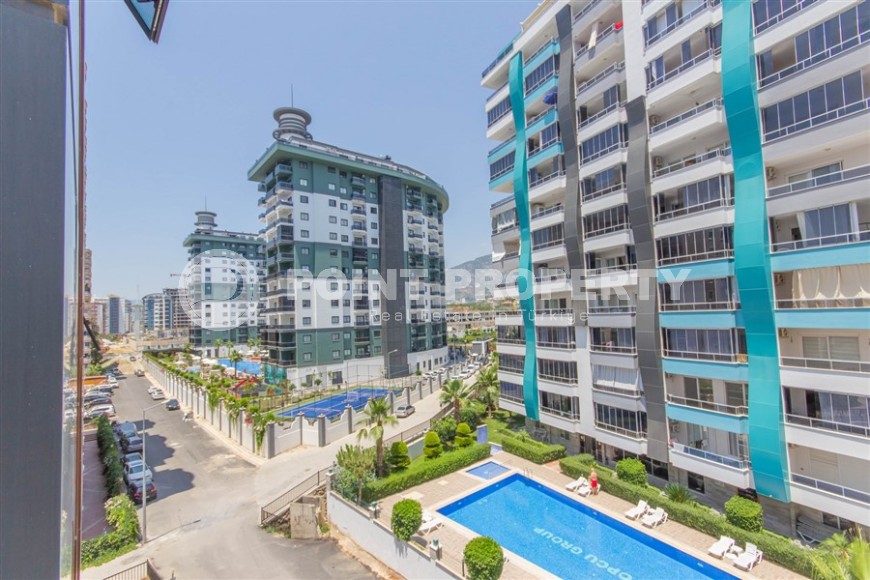 Bright, comfortable apartment 1+1, on an area of 70 m2, on the 4th floor, in the center of a modern, developed area of Alanya - Mahmutlar-id-6416-photo-9