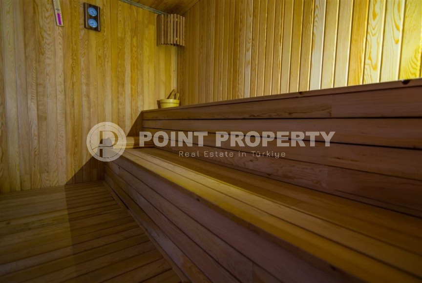 Bright, comfortable apartment 1+1, on an area of 70 m2, on the 4th floor, in the center of a modern, developed area of Alanya - Mahmutlar-id-6416-photo-11