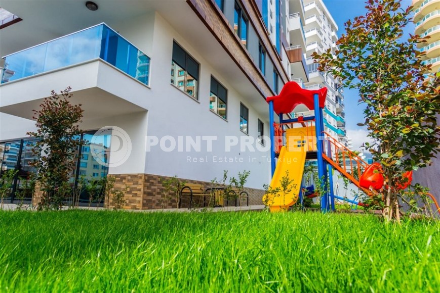 Bright, comfortable apartment 1+1, on an area of 70 m2, on the 4th floor, in the center of a modern, developed area of Alanya - Mahmutlar-id-6416-photo-17