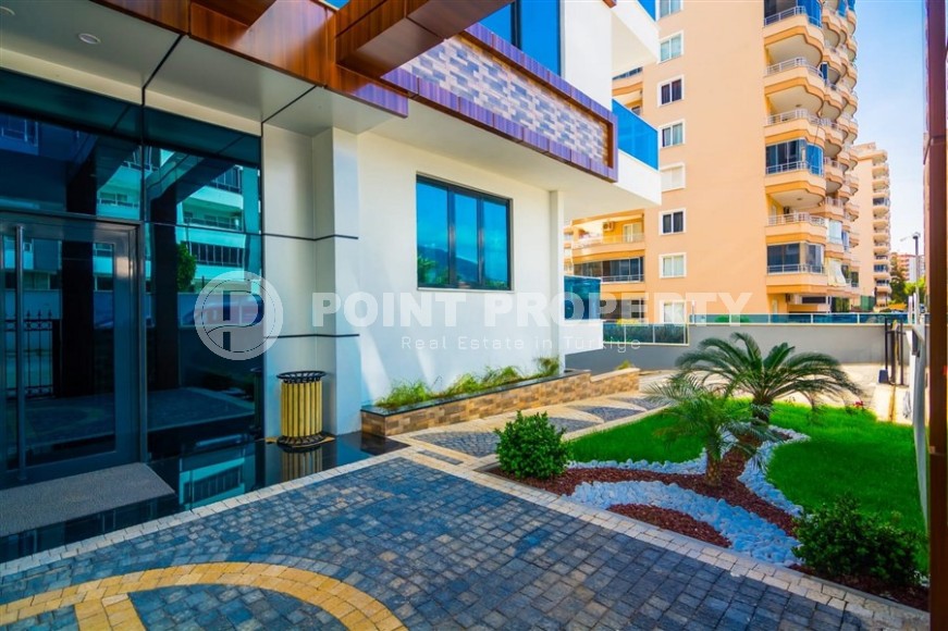 Bright, comfortable apartment 1+1, on an area of 70 m2, on the 4th floor, in the center of a modern, developed area of Alanya - Mahmutlar-id-6416-photo-19