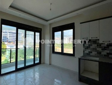 Новая квартира с чистовой отделкой, в живописном районе Аланьи - Чиплаклы-id-6425-фото-3