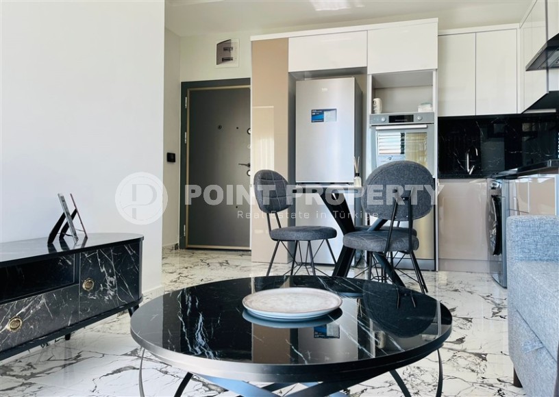 Small modern apartment with a total area of 50 m2 in a picturesque, quiet area of Alanya - Upper Oba-id-6429-photo-3