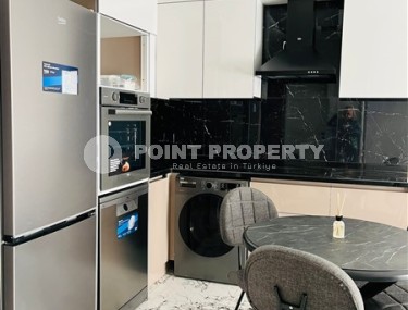 Small modern apartment with a total area of 50 m2 in a picturesque, quiet area of Alanya - Upper Oba-id-6429-photo-4