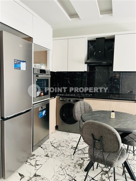 Small modern apartment with a total area of 50 m2 in a picturesque, quiet area of Alanya - Upper Oba-id-6429-photo-4