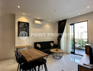 Small stylish apartment 1+1, on an area of 55 m2, in the modern area of Alanya - Mahmutlar-id-6430-photo-2