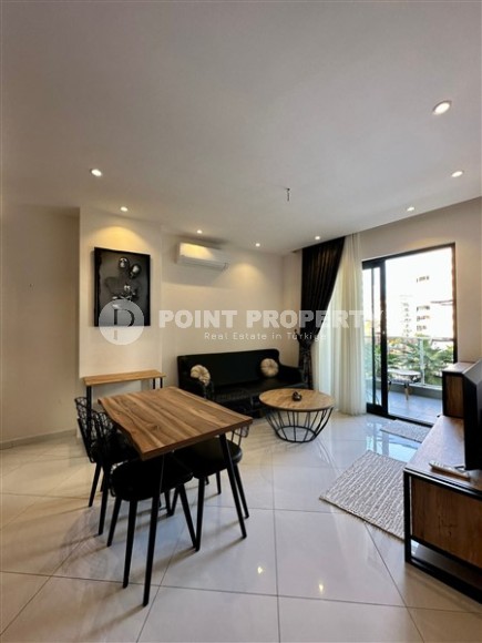 Small stylish apartment 1+1, on an area of 55 m2, in the modern area of Alanya - Mahmutlar-id-6430-photo-2