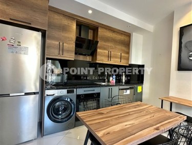 Small stylish apartment 1+1, on an area of 55 m2, in the modern area of Alanya - Mahmutlar-id-6430-photo-3