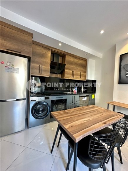 Small stylish apartment 1+1, on an area of 55 m2, in the modern area of Alanya - Mahmutlar-id-6430-photo-3