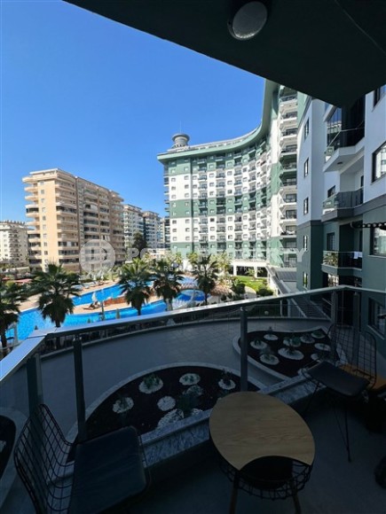 Small stylish apartment 1+1, on an area of 55 m2, in the modern area of Alanya - Mahmutlar-id-6430-photo-7