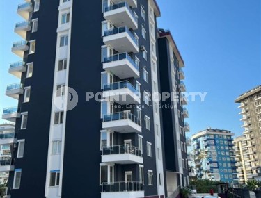 Small apartment with fine finishing, 650 meters from the sea, in the center of Mahmutlar-id-6433-photo-1