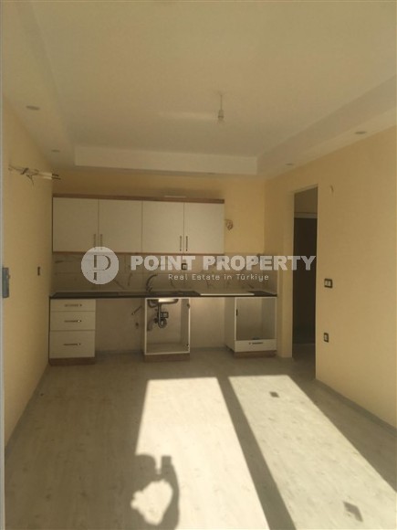 Small apartment with fine finishing, 650 meters from the sea, in the center of Mahmutlar-id-6433-photo-2