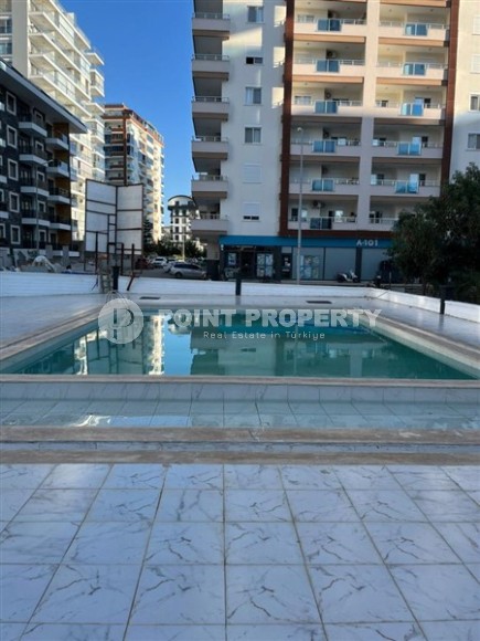 Small apartment with fine finishing, 650 meters from the sea, in the center of Mahmutlar-id-6433-photo-8