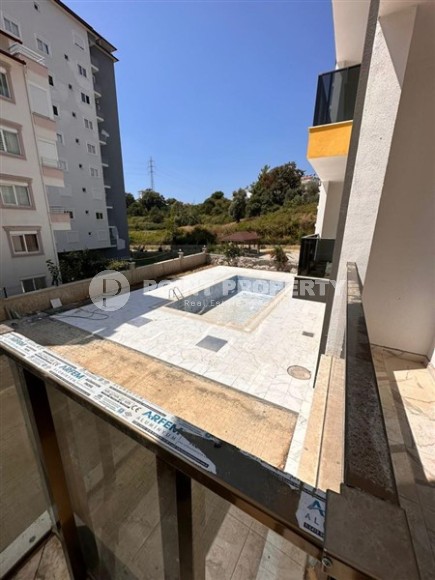 Компактная новая квартира 1+1, в комфортабельном жилом комплексе с бассейном и садом-id-6448-фото-11