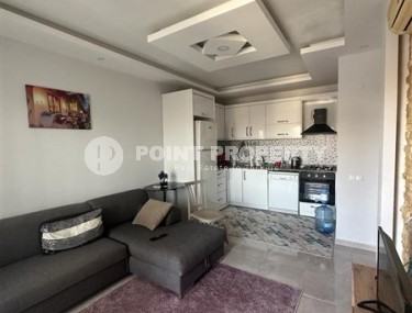 Небольшая квартира 1+1, общей площадью 55 м2, в центре спокойного района Аланьи - Конаклы-id-6459-фото-2