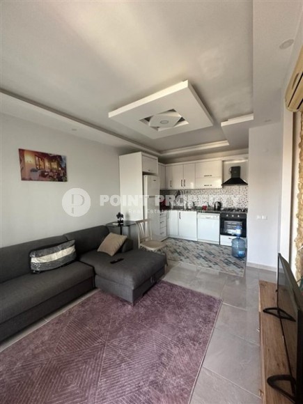 Небольшая квартира 1+1, общей площадью 55 м2, в центре спокойного района Аланьи - Конаклы-id-6459-фото-2