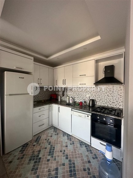 Небольшая квартира 1+1, общей площадью 55 м2, в центре спокойного района Аланьи - Конаклы-id-6459-фото-3