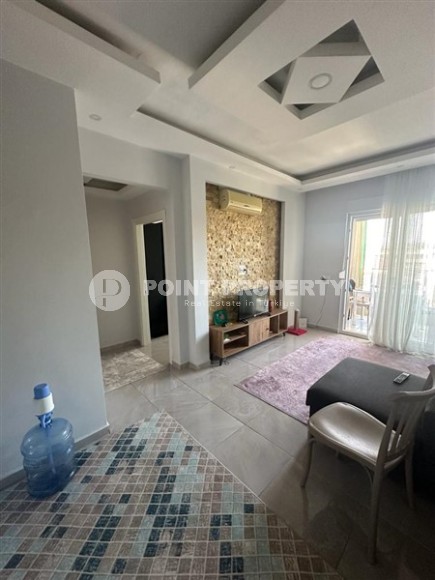 Небольшая квартира 1+1, общей площадью 55 м2, в центре спокойного района Аланьи - Конаклы-id-6459-фото-4