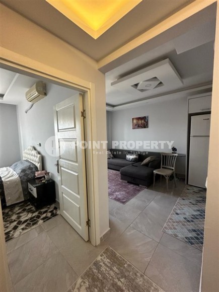 Небольшая квартира 1+1, общей площадью 55 м2, в центре спокойного района Аланьи - Конаклы-id-6459-фото-8