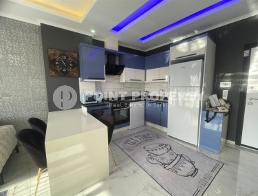 Stylish, modern 1+1 apartment, with a total area of 57 m2, in a developed area of Alanya - Mahmutlar-id-6472-photo-3