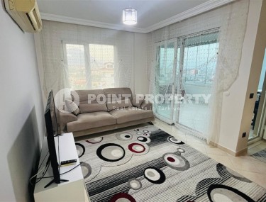 Apartment with two bedrooms and a spacious glazed balcony, in a modern, quiet area of Alanya - Cikcilli-id-6478-photo-2