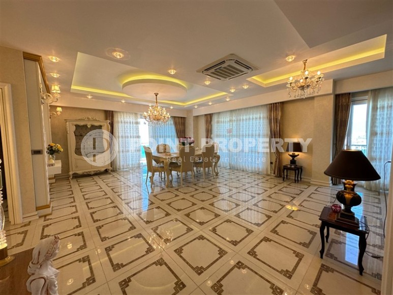 Large two-level apartment with a classic design, 250 meters from the sea, in the center of the modern area of Alanya - Mahmutlar-id-5953-photo-1