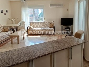 Comfortable, furnished apartment 2+1, on the first line from the sea, in the center of Mahmutlar district Description:-id-6491-photo-1