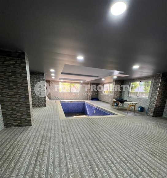 Компактная студия, общей площадью 40 м2, на 1-м этаже, в центре района Махмутлар-id-6496-фото-12