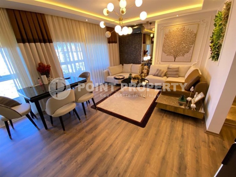 Stylish two-level apartment with modern design, on the first line from the sea, in the center of the prestigious area of Alanya - Kestel-id-6515-photo-1