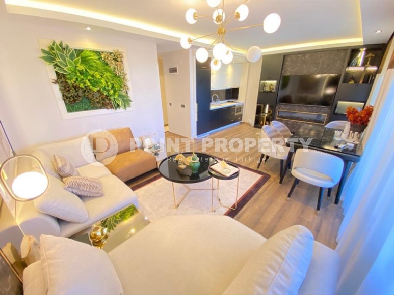 Stylish two-level apartment with modern design, on the first line from the sea, in the center of the prestigious area of Alanya - Kestel-id-6515-photo-3
