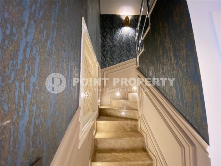 Stylish two-level apartment with modern design, on the first line from the sea, in the center of the prestigious area of Alanya - Kestel-id-6515-photo-9