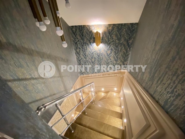 Stylish two-level apartment with modern design, on the first line from the sea, in the center of the prestigious area of Alanya - Kestel-id-6515-photo-10