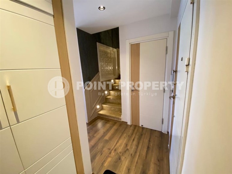 Stylish two-level apartment with modern design, on the first line from the sea, in the center of the prestigious area of Alanya - Kestel-id-6515-photo-11