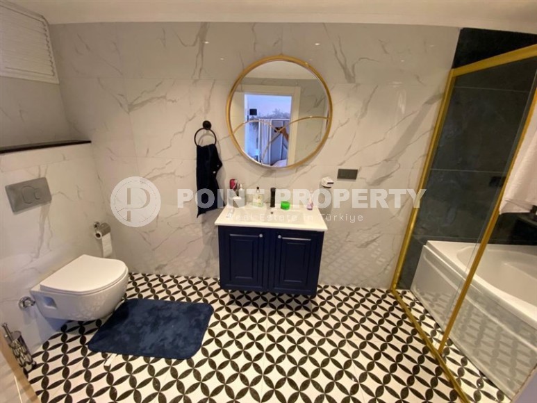 Stylish two-level apartment with modern design, on the first line from the sea, in the center of the prestigious area of Alanya - Kestel-id-6515-photo-12