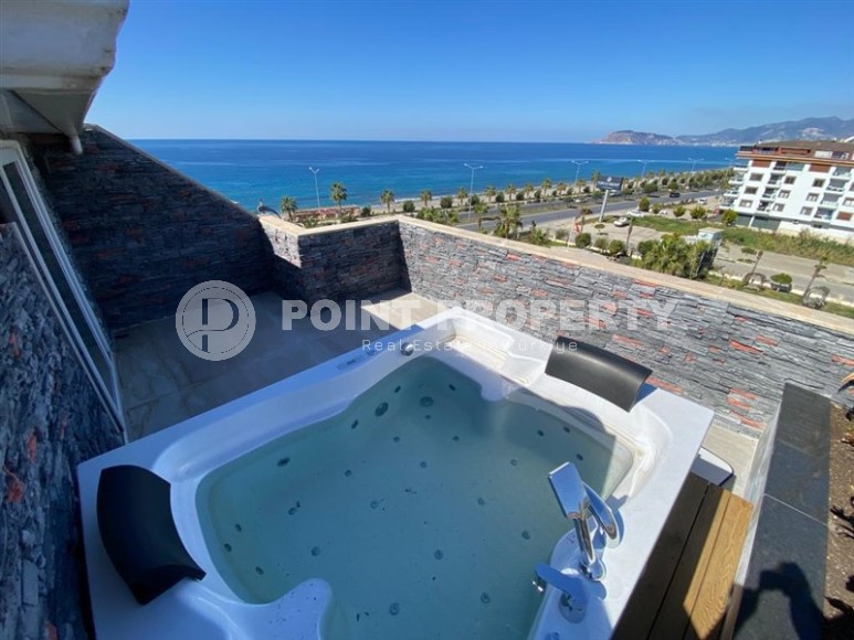 Stylish two-level apartment with modern design, on the first line from the sea, in the center of the prestigious area of Alanya - Kestel-id-6515-photo-19