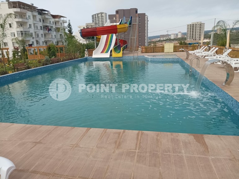 Апартаменты в жилом комплексе на этапе строительства, в популярном курортном и коммерческом районе Мерсина - Аяш-id-6517-фото-2