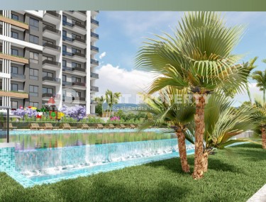 Апартаменты в жилом комплексе на этапе строительства, в популярном курортном и коммерческом районе Мерсина - Аяш-id-6517-фото-3