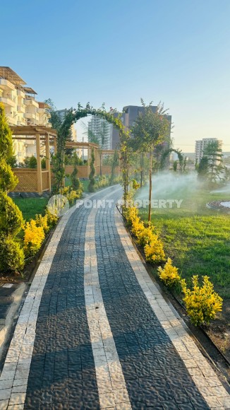 Апартаменты в жилом комплексе на этапе строительства, в популярном курортном и коммерческом районе Мерсина - Аяш-id-6517-фото-7