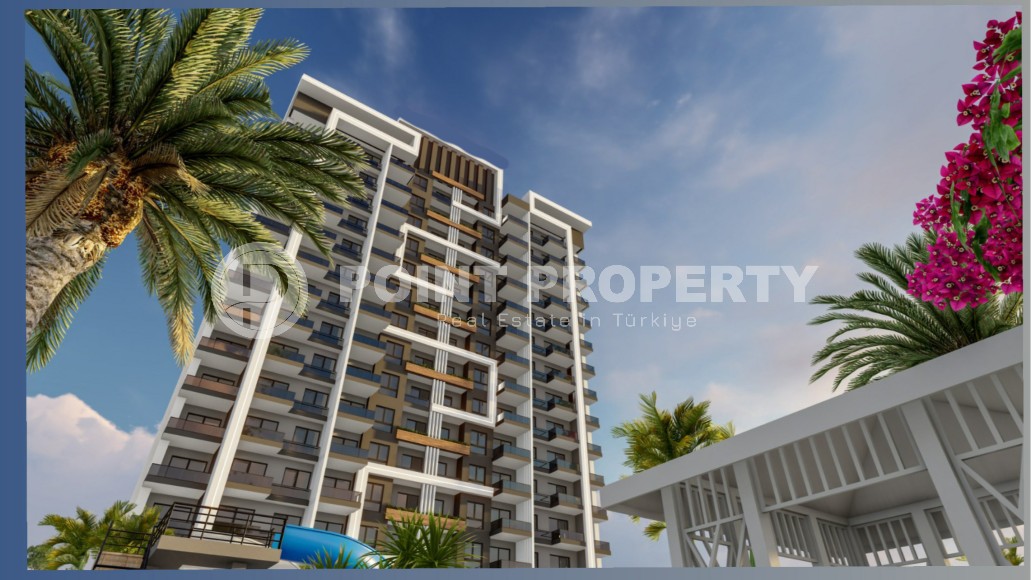 Апартаменты в жилом комплексе на этапе строительства, в популярном курортном и коммерческом районе Мерсина - Аяш-id-6517-фото-11